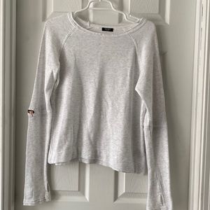 Heather gray sweater with rose gold zipper on sleeves!